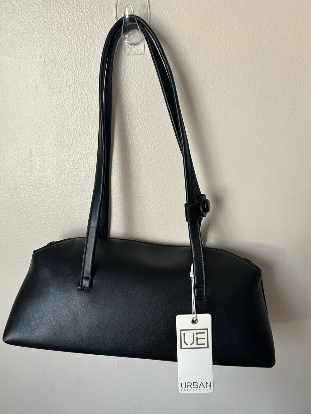 Urban Expressions shoulder bag silhouette 
a branded pet/smoke free home